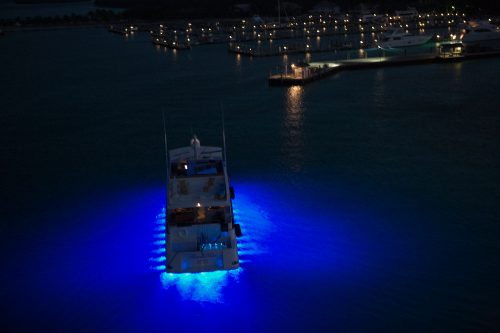 Top down shot of a superyacht lit up by LEDs